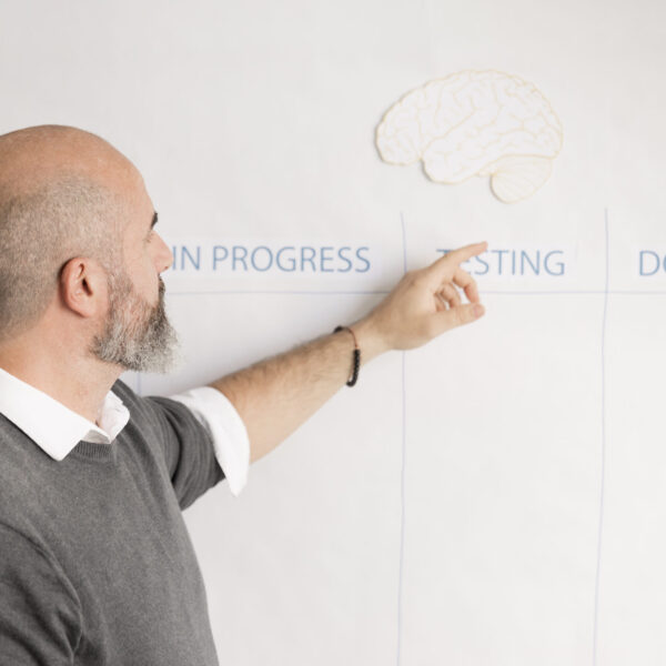 bearded-man-presenting-business-plan